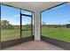 Enclosed patio with brick flooring overlooks a spacious yard with fencing and green views at 3631 Pebble Ter, Punta Gorda, FL 33980