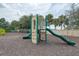 Community playground with climbing structure and slides for outdoor recreation at 3631 Pebble Ter, Punta Gorda, FL 33980