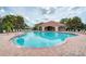 Community pool includes a covered seating area and plenty of lounge chairs at 3631 Pebble Ter, Punta Gorda, FL 33980