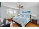 Comfortable bedroom with natural light from bay window and charming window seat at 4240 Marseilles Ave # 3248, Sarasota, FL 34233