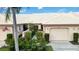 Charming single-story home featuring a beautiful landscaped front yard, neutral color palette and an attached garage at 4240 Marseilles Ave # 3248, Sarasota, FL 34233