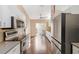Open kitchen features stainless appliances, sleek countertops, and access to the backyard at 4240 Marseilles Ave # 3248, Sarasota, FL 34233