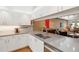 Contemporary kitchen with stainless steel sink, countertop, and white cabinets at 4240 Marseilles Ave # 3248, Sarasota, FL 34233