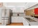 Modern kitchen highlighting stainless steel appliances and stylish white cabinetry at 4240 Marseilles Ave # 3248, Sarasota, FL 34233