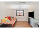 Cozy living room featuring modern furniture, neutral walls, and wood floors at 4240 Marseilles Ave # 3248, Sarasota, FL 34233