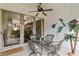 Charming patio featuring comfortable seating, a ceiling fan, and delightful decorative accents at 4240 Marseilles Ave # 3248, Sarasota, FL 34233