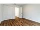 Bedroom with wood floor and closet at 4789 Vaquero St, North Port, FL 34286