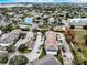 Aerial view of apartment complex showcases ponds and parking nestled in a lush, green landscape at 4802 51 W St # 1017, Bradenton, FL 34210