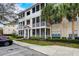 Apartment building showcases screened-in balconies and well-maintained landscaping, with parking nearby at 4802 51 W St # 1017, Bradenton, FL 34210