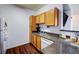 The kitchen features wood cabinets, countertop space, and stainless steel appliances at 4802 51 W St # 1017, Bradenton, FL 34210