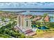 Luxury condo building boasts waterfront views, a pool, lush landscaping, and convenient parking for upscale living at 501 Haben Blvd # 204, Palmetto, FL 34221