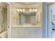 Bathroom with double sinks and a spacious shower at 501 Haben Blvd # 204, Palmetto, FL 34221