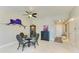 Bright dining area with a glass table, stylish chairs, and modern decor in an open-concept design at 501 Haben Blvd # 204, Palmetto, FL 34221