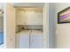 Bright laundry room with modern appliances at 501 Haben Blvd # 204, Palmetto, FL 34221