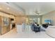 Inviting living room with an open-concept design, connecting to the kitchen and offering balcony access at 501 Haben Blvd # 204, Palmetto, FL 34221