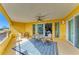 Spacious outdoor patio with ample seating, offering serene views, natural light, and seamless indoor-outdoor living at 501 Haben Blvd # 204, Palmetto, FL 34221