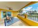 Inviting covered patio featuring outdoor seating and railing with ornamental features with great water view at 501 Haben Blvd # 204, Palmetto, FL 34221