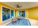 Open patio area with seating, showcasing seamless transition to interior spaces through sliding glass doors at 501 Haben Blvd # 204, Palmetto, FL 34221