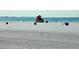 Panoramic view of Siesta Beach showing the lifeguard stand and open spaces at 514 Ralph St, Sarasota, FL 34242