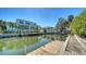Peaceful canal view highlighting waterfront homes with docks and tropical landscaping at 514 Ralph St, Sarasota, FL 34242