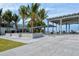 Outdoor seating area at Siesta Beach, showcasing benches, tables, and convenient access to beachfront views at 514 Ralph St, Sarasota, FL 34242