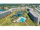 Experience luxury living with amazing amenities like pools, ponds with fountains, lush landscaping, and beach access at 5780 Midnight Pass Rd # 210, Sarasota, FL 34242
