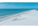 Beautiful beach offering a tranquil escape with soft white sand and clear blue waters, perfect for a seaside getaway at 5780 Midnight Pass Rd # 210, Sarasota, FL 34242