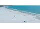 Scenic beach featuring fine white sands and gentle waves, ideal for leisurely strolls and enjoying the ocean breeze at 5780 Midnight Pass Rd # 210, Sarasota, FL 34242