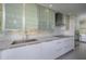 Modern kitchen featuring stainless steel appliances, sleek cabinetry, and ample counter space for cooking and prep at 5780 Midnight Pass Rd # 210, Sarasota, FL 34242
