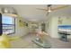 Inviting living room with an open layout to the kitchen, perfect for modern living at 5780 Midnight Pass Rd # 210, Sarasota, FL 34242