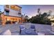 Backyard view featuring outdoor entertaining space, pool, and waterfront at 601 Avenida De Mayo, Sarasota, FL 34242
