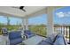Comfortable balcony furniture with view of community and waterways at 601 Avenida De Mayo, Sarasota, FL 34242