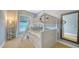 Cozy bedroom with bunk beds, a window, and a light blue painted wall at 601 Avenida De Mayo, Sarasota, FL 34242