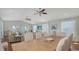 Dining area with view of the living room with comfortable seating at 601 Avenida De Mayo, Sarasota, FL 34242