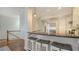 Open kitchen featuring granite countertops, modern stainless steel appliances, and breakfast bar seating at 601 Avenida De Mayo, Sarasota, FL 34242