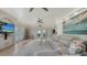 Open-concept living room featuring a sectional sofa, tile flooring, and recessed lighting at 601 Avenida De Mayo, Sarasota, FL 34242