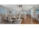 Spacious open-concept living and dining area with hardwood floors and lots of natural light at 601 Avenida De Mayo, Sarasota, FL 34242