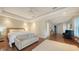 Spacious main bedroom suite with sitting area, hardwood floors, and large windows at 601 Avenida De Mayo, Sarasota, FL 34242
