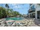 Refreshing pool area surrounded by seating, offering a serene outdoor experience at 601 Avenida De Mayo, Sarasota, FL 34242