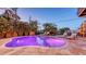 Backyard pool and patio with ample seating, creating a tranquil evening retreat at 601 Avenida De Mayo, Sarasota, FL 34242