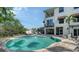 Enjoy a refreshing dip in the pool, nestled in a private backyard oasis at 601 Avenida De Mayo, Sarasota, FL 34242