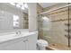 Bright bathroom featuring a shower, sink and toilet at 6512 Clemson St, Bradenton, FL 34207