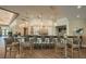 Modern bar area with stylish lighting, comfortable seating, and a full selection of drinks at 7015 Stanhope Pl, University Park, FL 34201