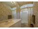 Well-lit bathroom featuring a vanity with ample counter space and a shower-tub combination at 7015 Stanhope Pl, University Park, FL 34201
