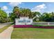 Attractive signage and landscaping at the entrance to University Park at 7015 Stanhope Pl, University Park, FL 34201