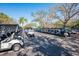 Rows of golf carts are ready for residents to enjoy a round of golf at 7015 Stanhope Pl, University Park, FL 34201