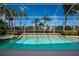 Beautiful screened pool with tropical landscaping and jacuzzi, perfect for relaxation at 7015 Stanhope Pl, University Park, FL 34201