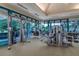 Weight room featuring state-of-the-art fitness equipment and large windows for natural light at 7015 Stanhope Pl, University Park, FL 34201