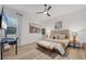 Bedroom showcasing a comfortable bed and a desk; ideal for work or study at 7024 Brier Creek Ct, Lakewood Ranch, FL 34202