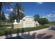 The Lakewood Ranch Golf and Country Club sign stands tall on manicured grounds with a blue sky and puffy white clouds overhead at 7024 Brier Creek Ct, Lakewood Ranch, FL 34202